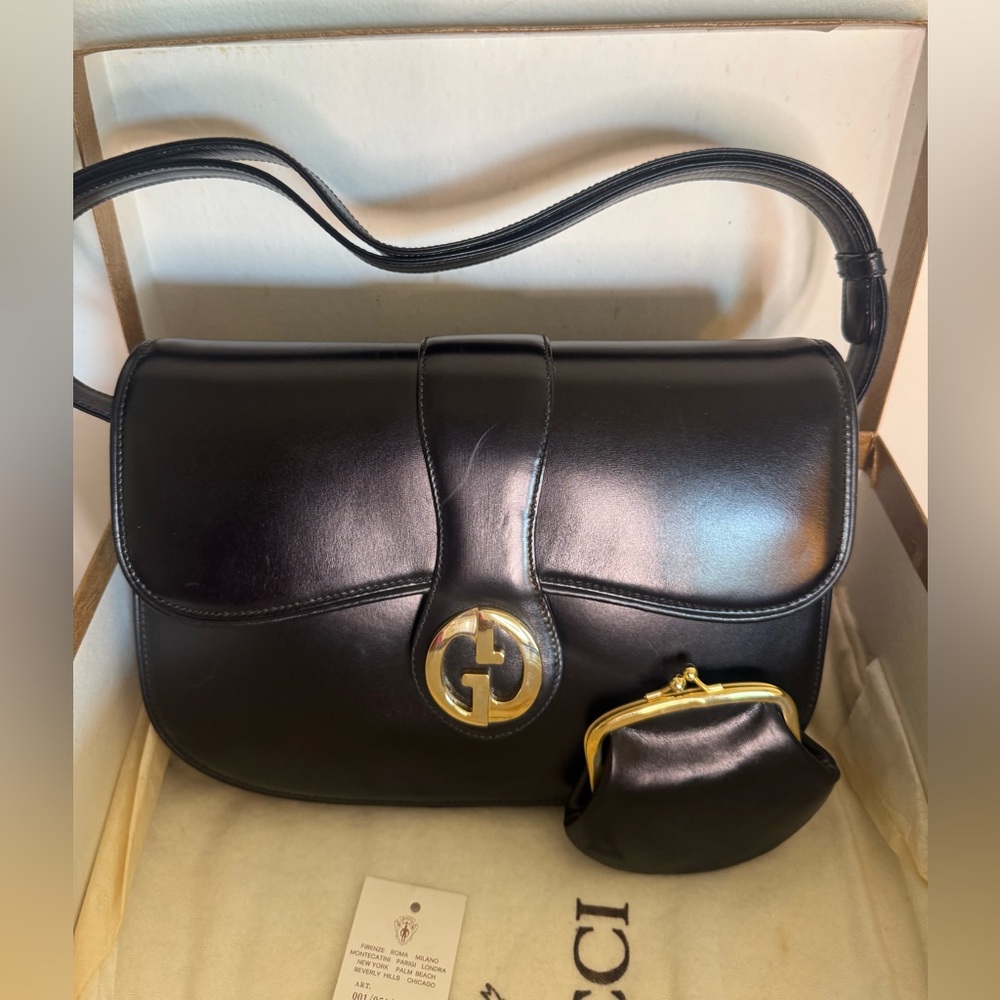 Vintage Gucci Black Leather Shoulder Bag with Gold Accent comes with coin purse